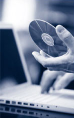 Hand holding a CD-ROM