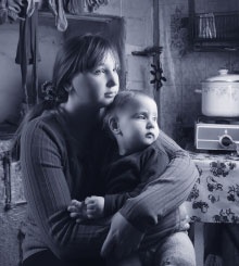 Woman holding a small child