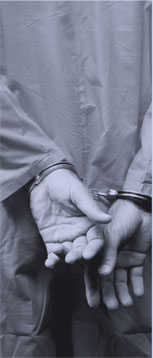 Hands in handcuffs