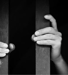 person behind bars