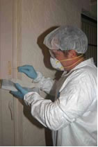 Photo of a chemist wearing safety gear and personal protective equipment