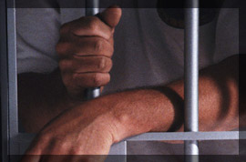 Photo of a suspect in a jail cell