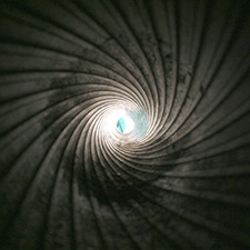 Photo of spiraled grooves from a gun barrel