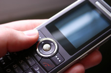 Photo of a hand holding a phone