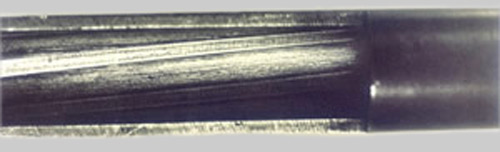 Cutaway section of a handgun barrel showing class and individual characteristics