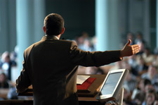 Man giving a speech with teleprompter