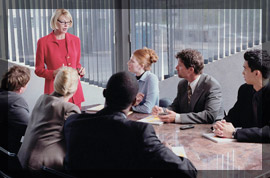 Photo of team in a conference room