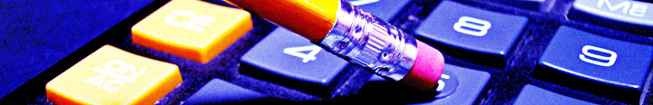 photo of a pencil eraser pressing a button on a calculator