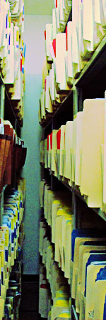 Photo of lots of file folders on shelves