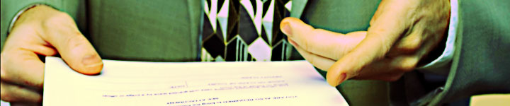 hands holding a piece of paper
