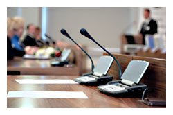 Photo of microphones in a courtroom