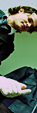investigator with bloody glove on