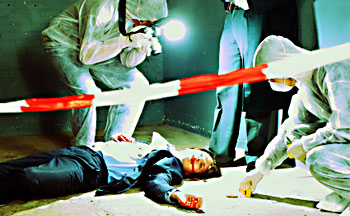Photo of someone taking a photo of a dead body at a crime scene