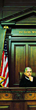 photo of a judge in a courtroom posing like he is thinking