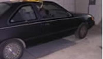 Photo of a crime scene surrounding a vehicle burglary