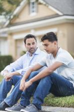 Mentor talking with a young man